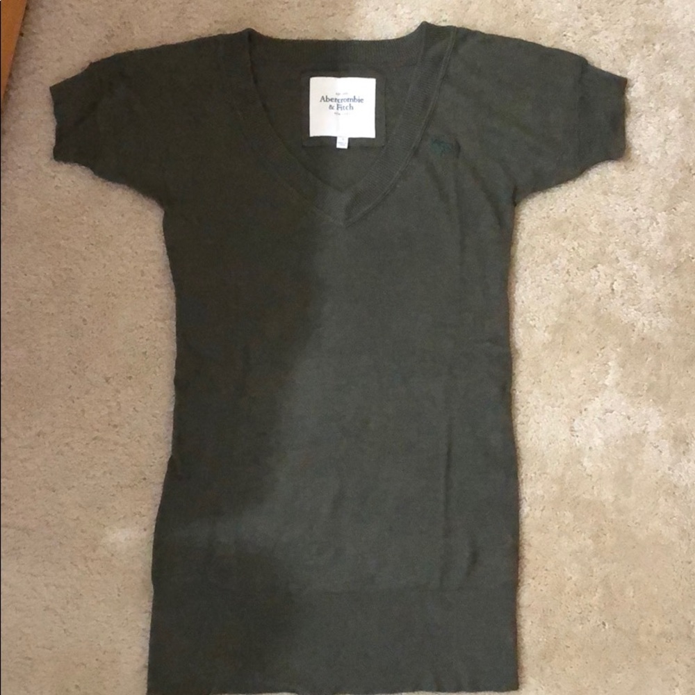 Size small, shirt sleeve sweater